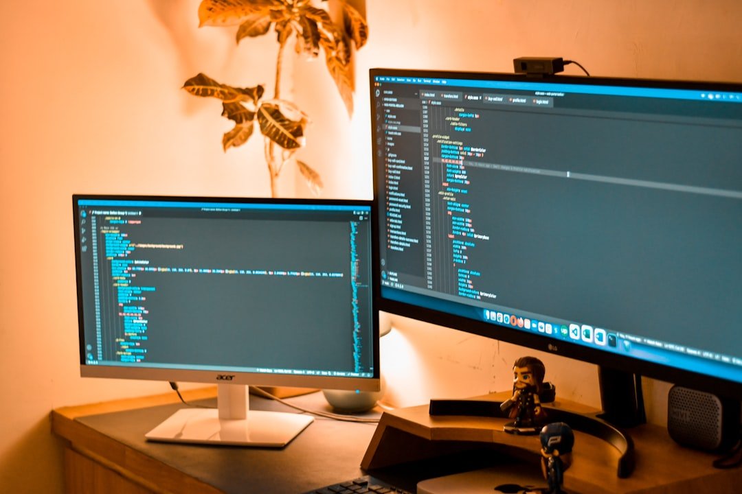coding screen with 2 monitors
